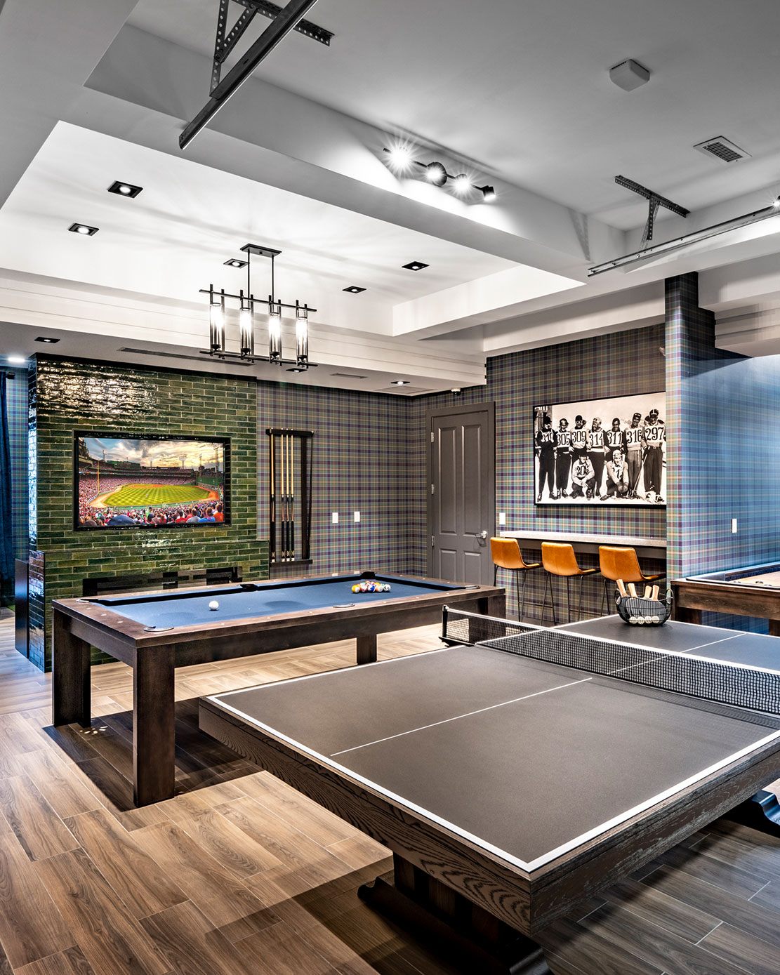 Clubhouse with pool table and televisions luxury amenity for residents